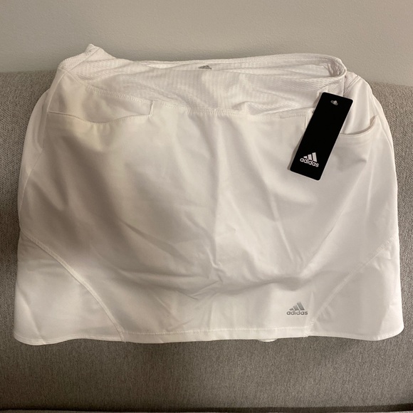adidas Pants - NWT Adidas white golf skort (shorts attached) 2 front pockets, 1 back pocket